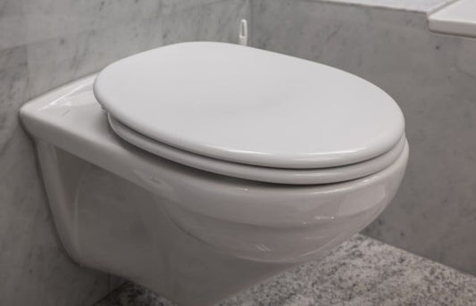 Comment installer un abattant WC avec frein de chute ?