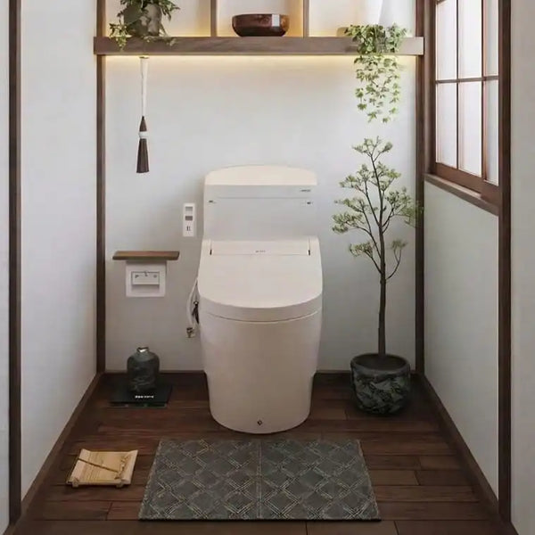 WC Japonais complet installé dans des toilettes à la décoration zen